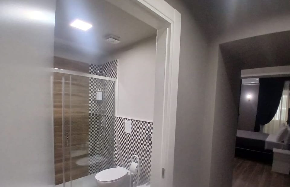 Comfort Double or Twin Room | Bathroom | Shower, hair dryer, bathrobes, slippers
