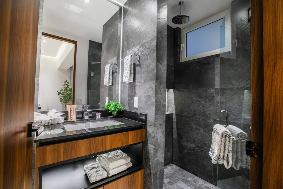 Master Bathroom — Stocked with quality towels and complete with rain-shower head