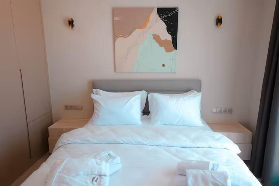 Premium bedding, down comforters, desk, laptop workspace