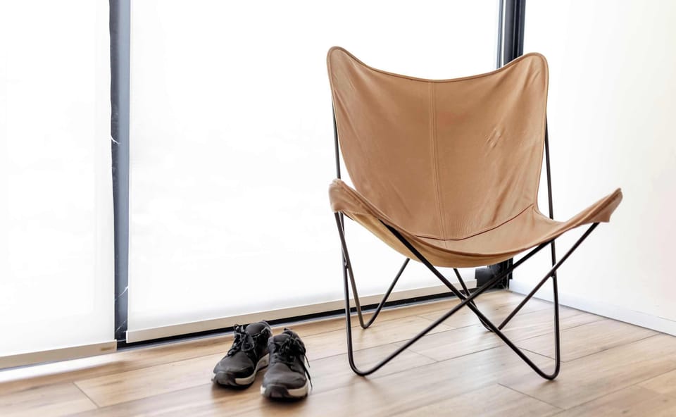 Stylish leather lounge chair by the window, a quiet corner to unwind