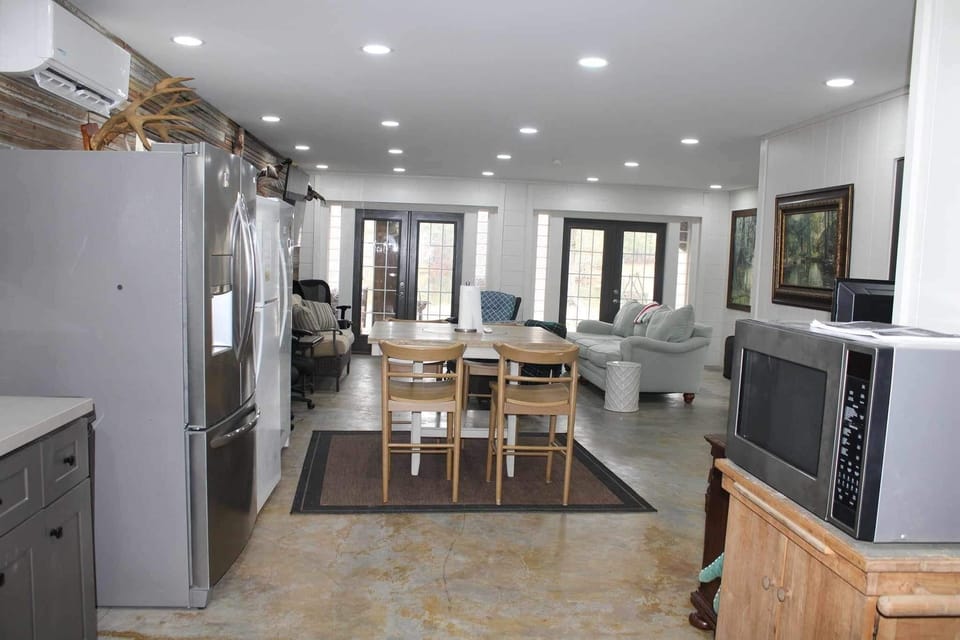 Downstairs Area with Full Kitchen, dining table for 4, Living Area and Desk w/ch