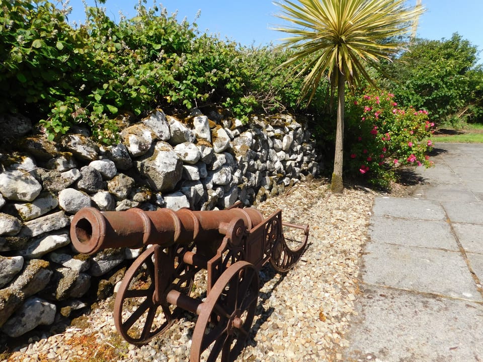 Garden patio with cannon