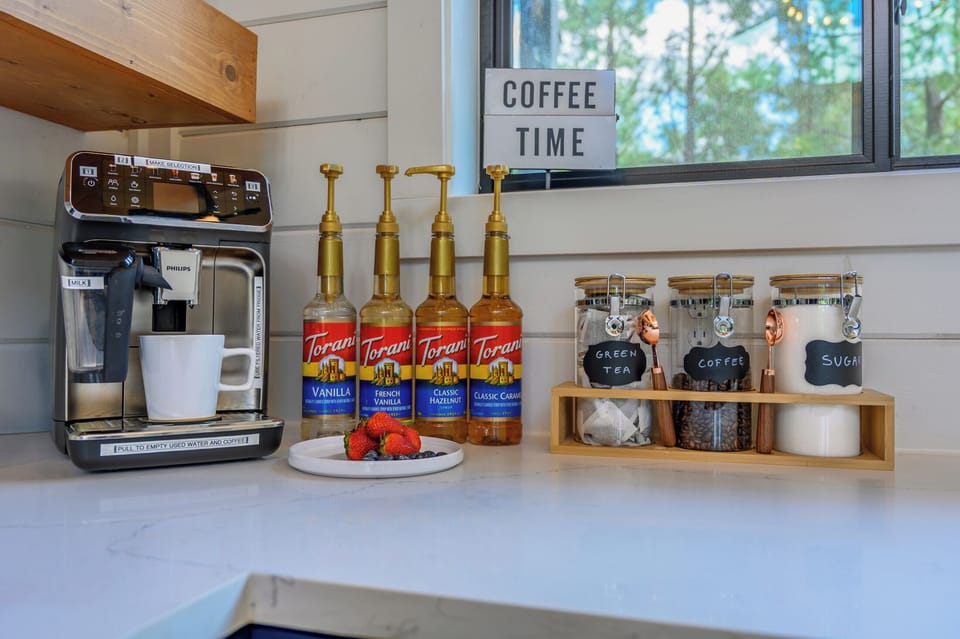 Coffee Station: Sip on espresso delights with flavored syrups and fresh brews in style!
