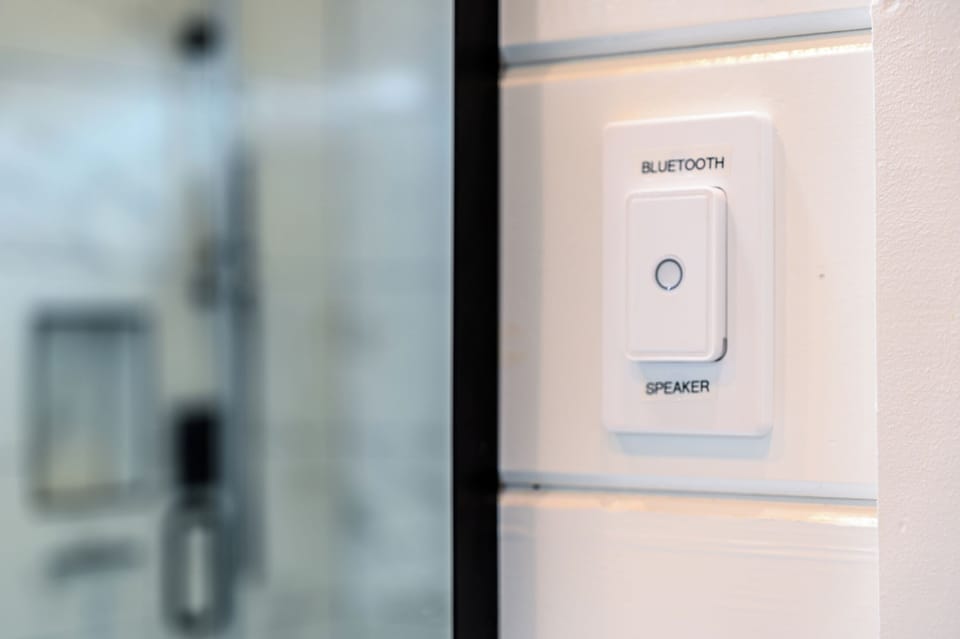 Bathroom includes built-in Bluetooth speaker for music while you shower.