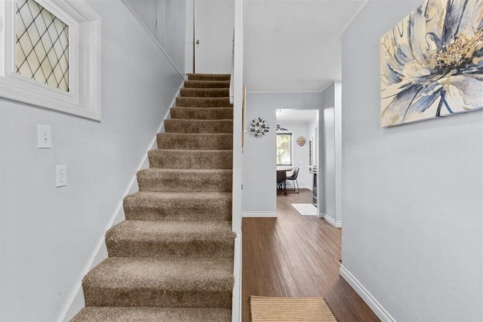 Upstairs to the small tv room area & Bedroom #2