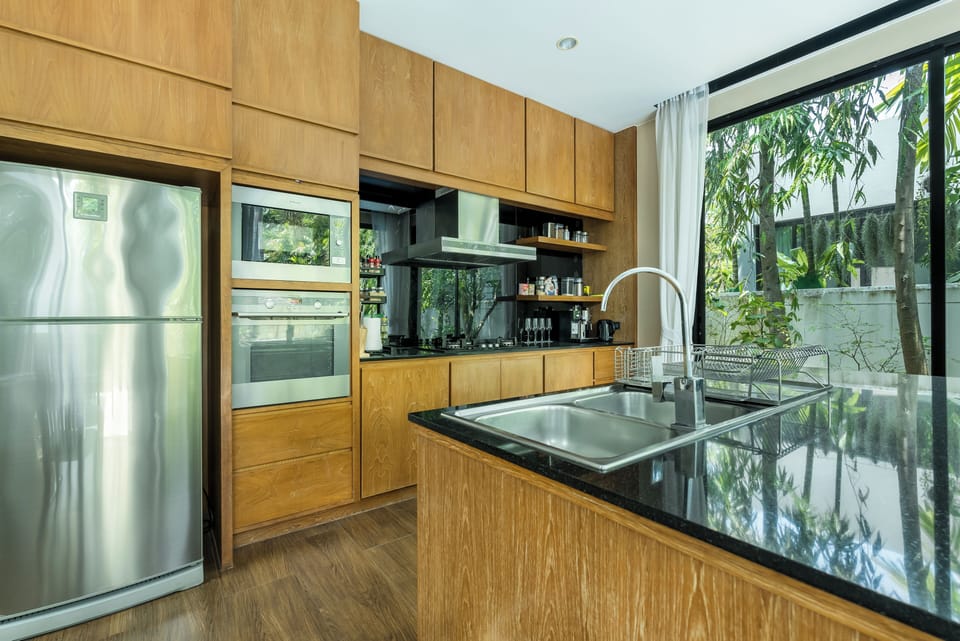 Villa | Private kitchen | Full-size fridge, microwave, oven, stovetop