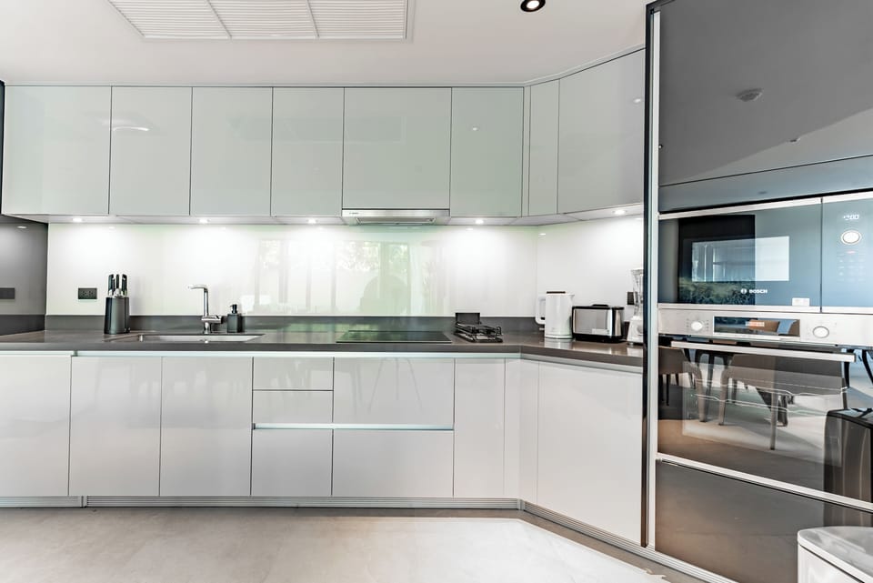 Premium Apartment | Private kitchen | Full-size fridge, microwave, stovetop, espresso maker