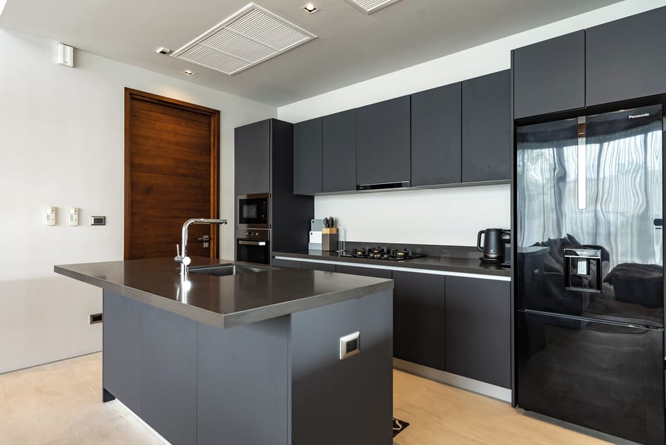 Villa | Private kitchen | Dining tables