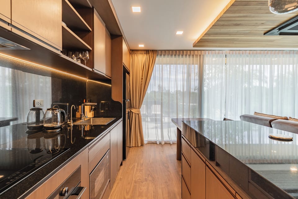 Villa | Private kitchen | Electric kettle, dining tables