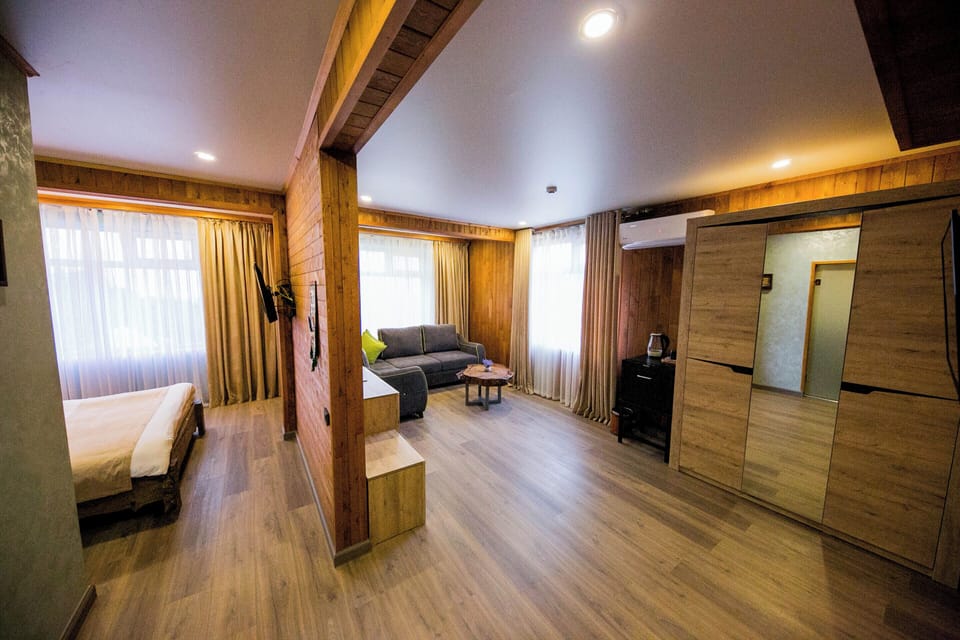 Luxury Quadruple Room, Garden View | In-room safe, iron/ironing board, free WiFi, bed sheets