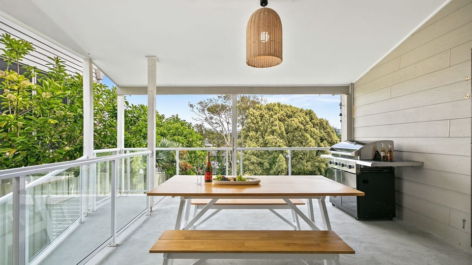 Back patio with BBQ and seating
