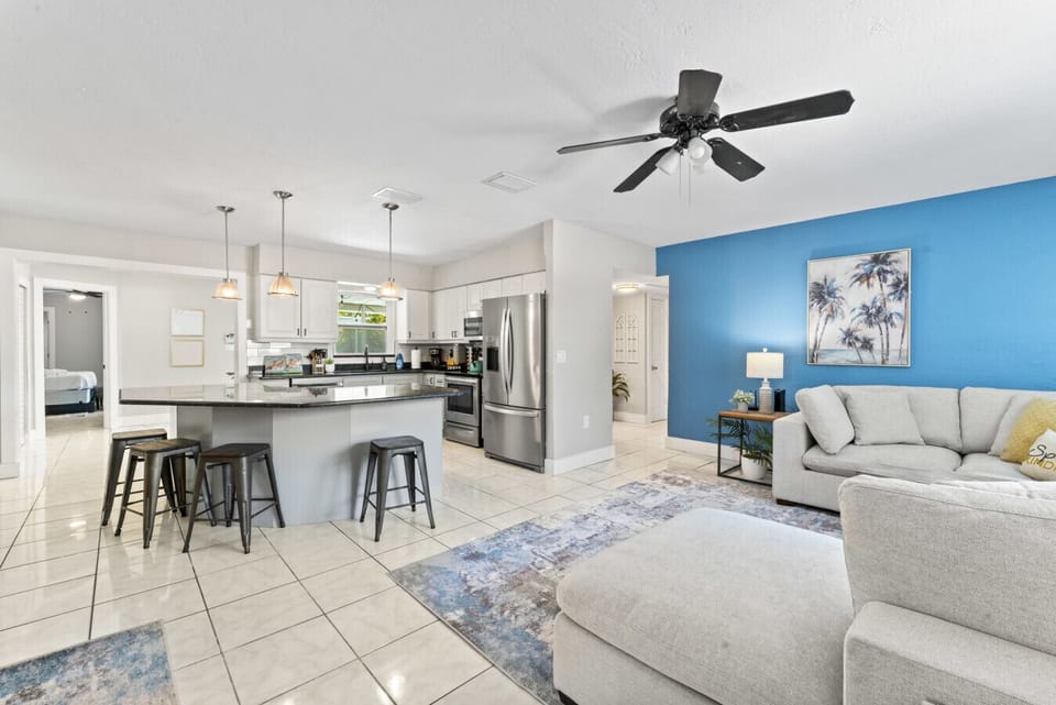 Entrance opens up to an open concept kitchen & Living Room