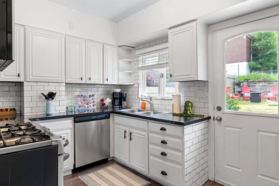 The kitchen area has direct access to the outdoor area