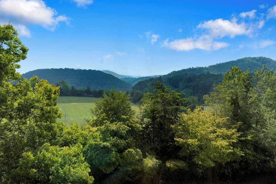 Take in the Beautiful Mountain Views from the Wrap Around Deck All Year Long!