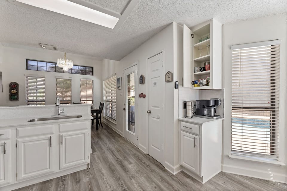Fully equipped kitchen with modern appliances.