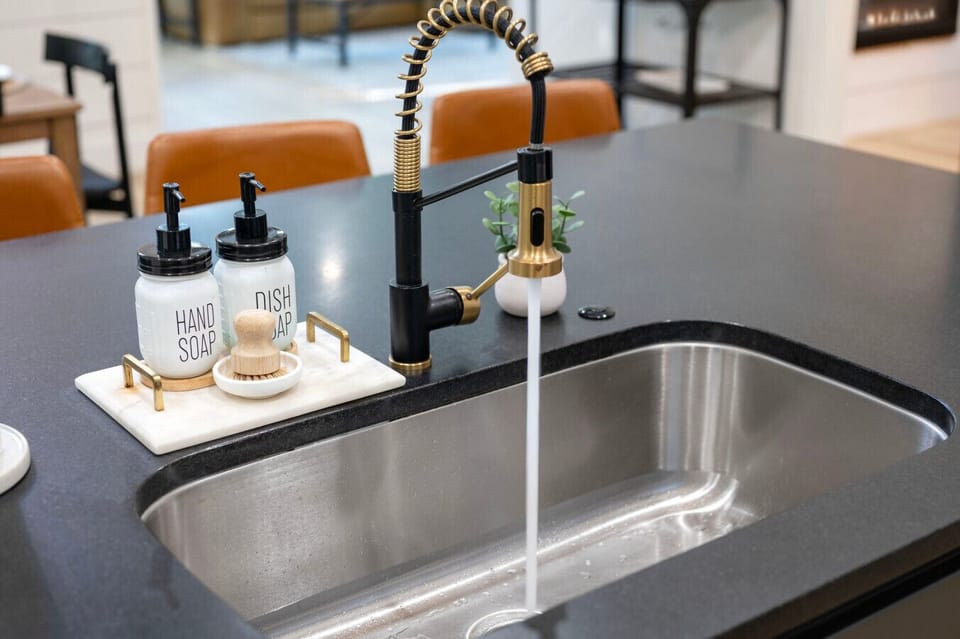 Even the simple moments like washing up feel elevated in this thoughtfully designed kitchen.