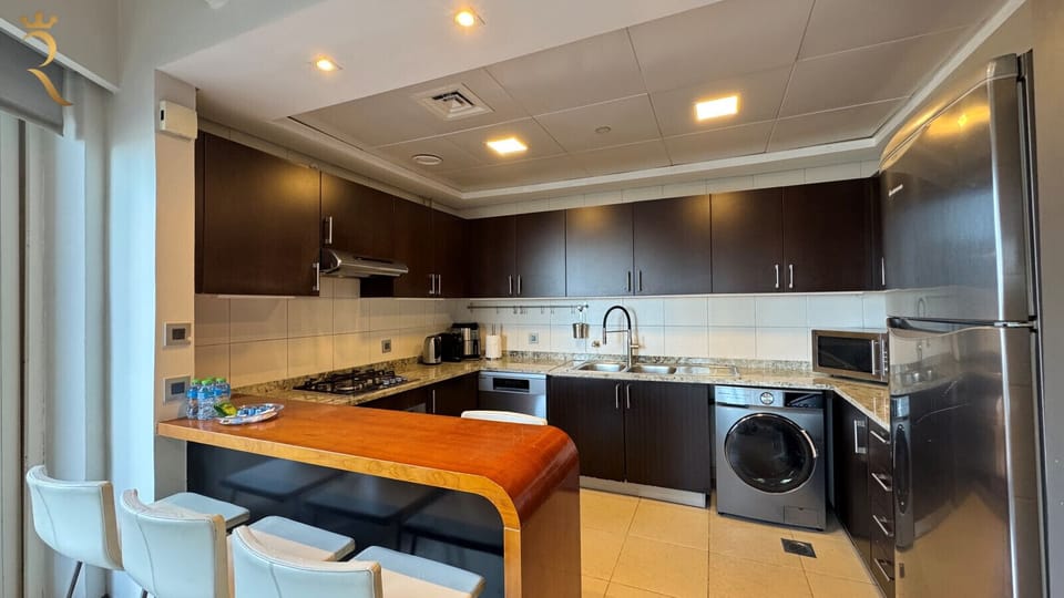 Coffee & Essentials Stocked with cookware, tableware, and kitchen essentials for your stay.