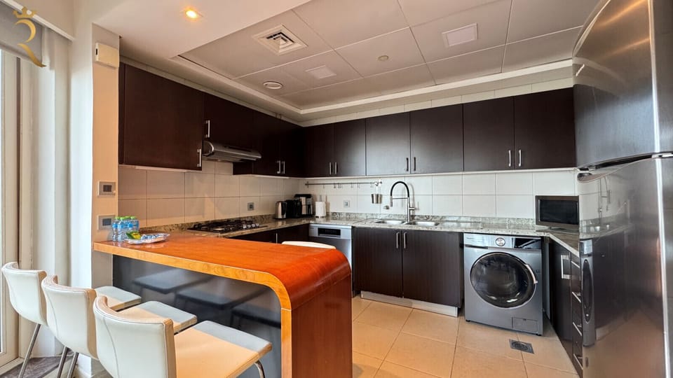 Coffee & Essentials Stocked with cookware, tableware, and kitchen essentials for your stay.