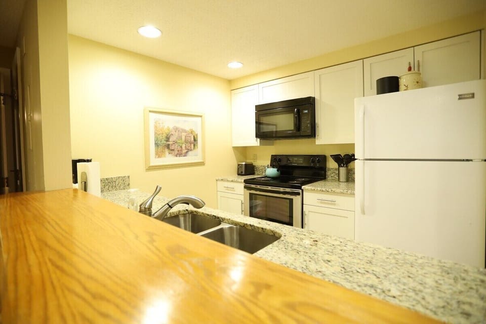 Full Kitchen with Serving Bar in Resort Condo
