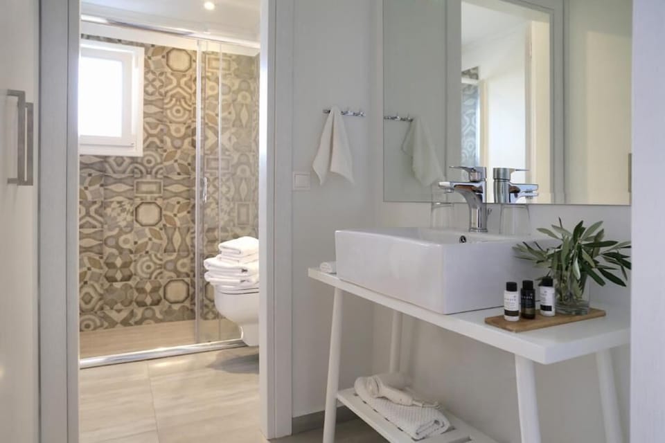 Superior Double Room | Bathroom | Shower, designer toiletries, hair dryer, bathrobes