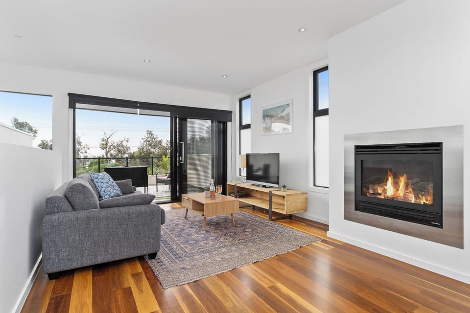 Top floor living with fireplace