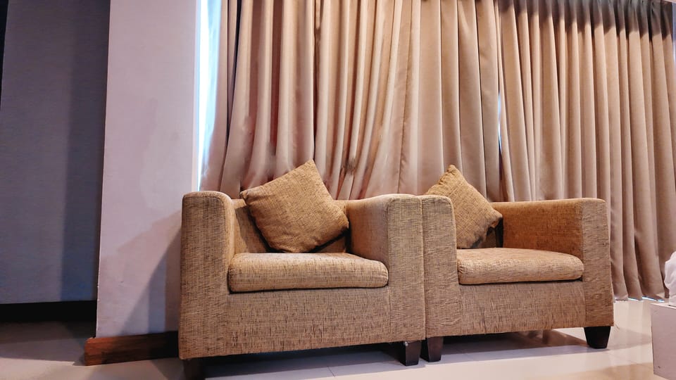 In-room safe, laptop workspace, blackout drapes, soundproofing