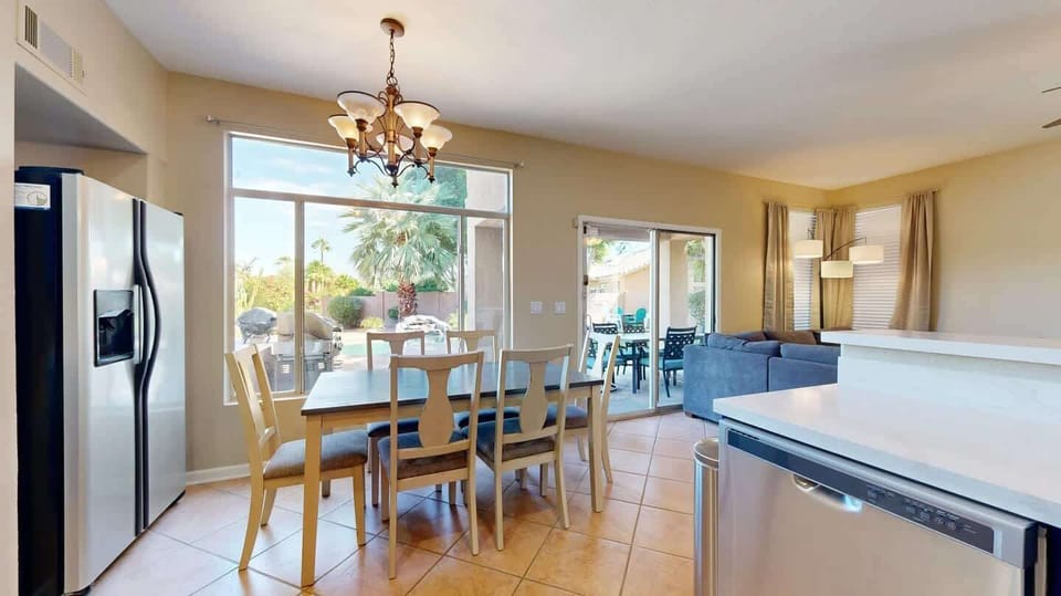 Enjoy a meal and the peaceful view of the backyard in this perfect dining space. 