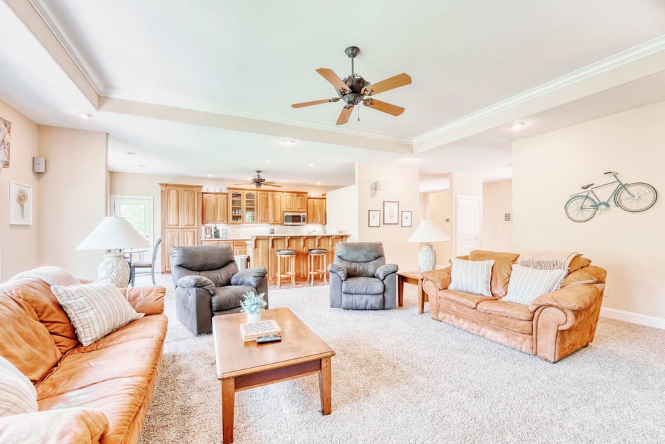 Spacious and sophisticated living room, showcasing a harmonious blend of modern and classic design elements. A haven of warmth and elegance.