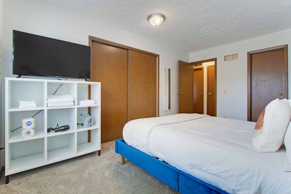 Queen bed and Smart TV in the private bedroom