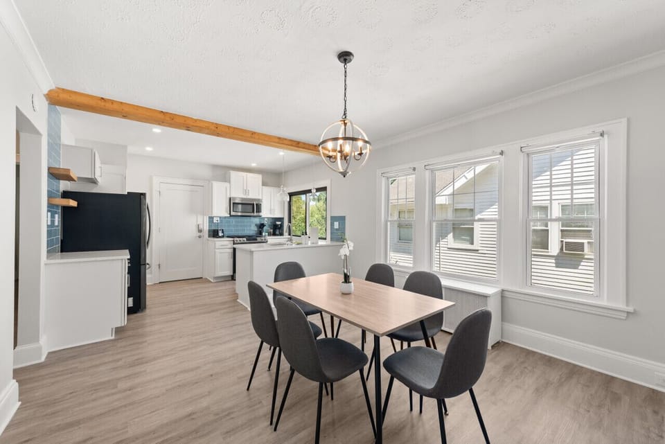 Bright open-concept living, dining, and kitchen spaces designed for comfort, connection, and longer stays.