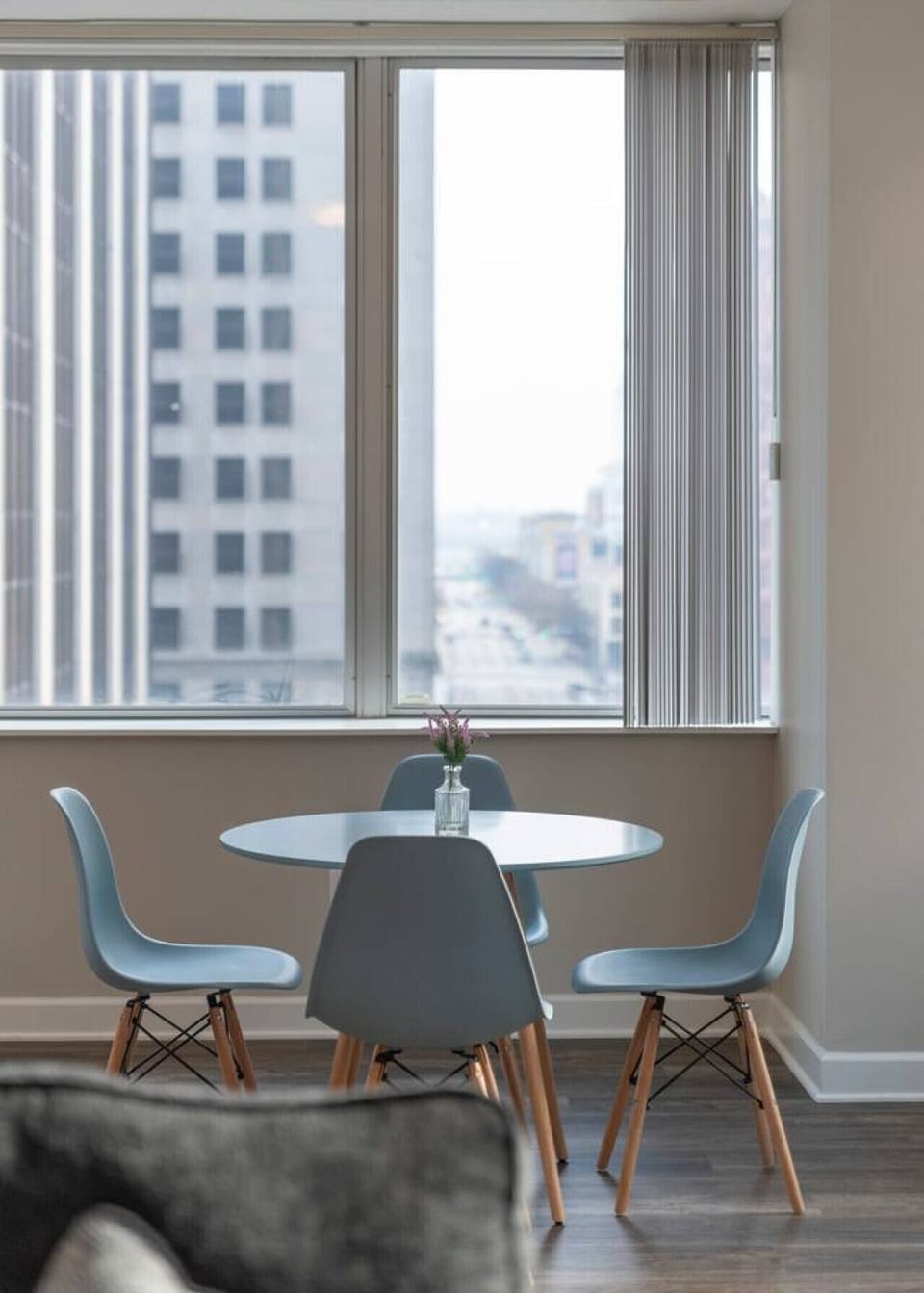 Kitchen island overlooking the downtown streets, with a bright setting for meals or coffee.