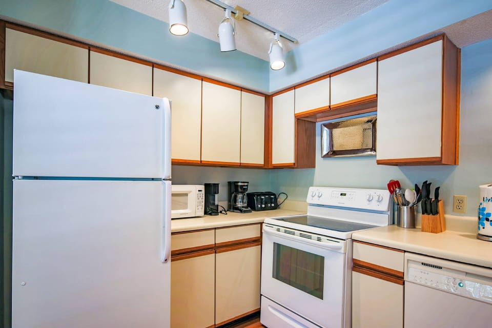 There's plenty of room in the kitchen for you and your guests to prepare your meals.