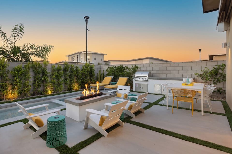 Unwind by the firepit, lounge poolside in comfortable chairs, or enjoy meals outdoors at the patio dining area—this space is made for relaxation and connection.