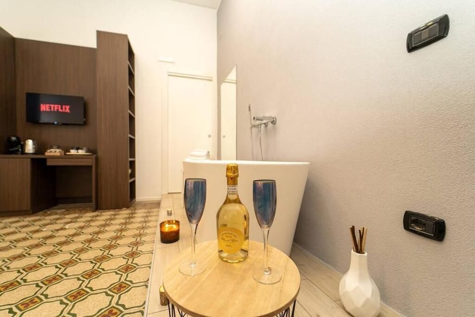 Deluxe Quadruple Room, Balcony, City View | In-room safe, blackout drapes, iron/ironing board, WiFi (free)