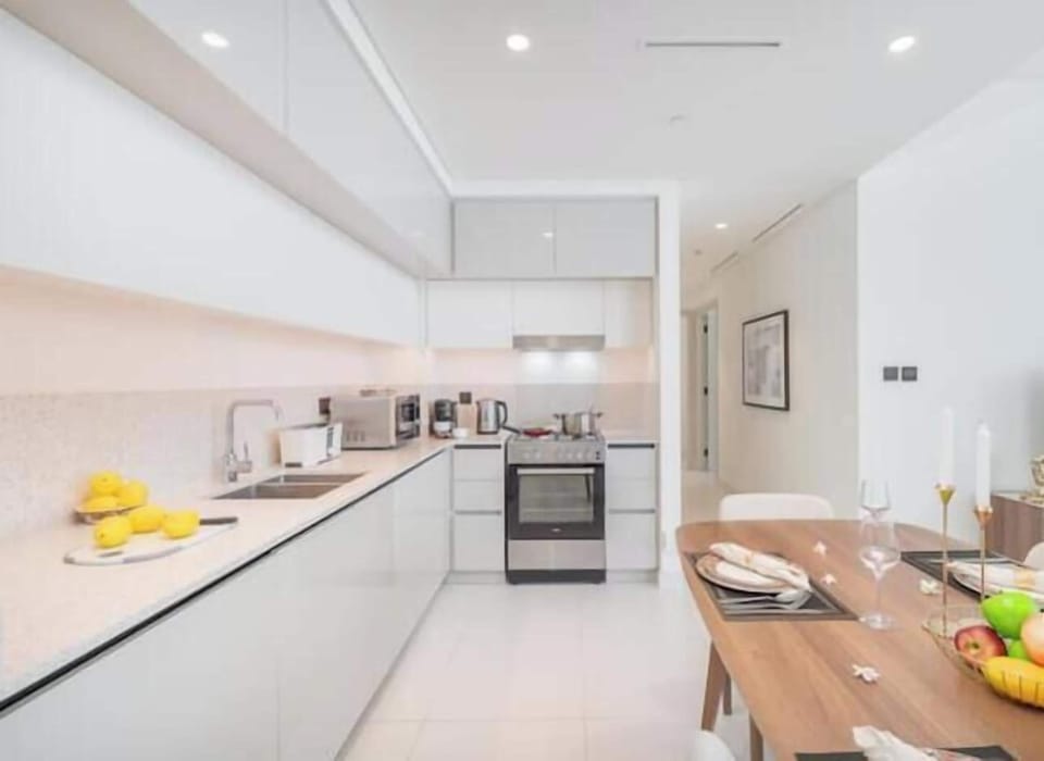 Luxury Apartment, Beach View | Private kitchen | Full-size fridge, microwave, oven, stovetop