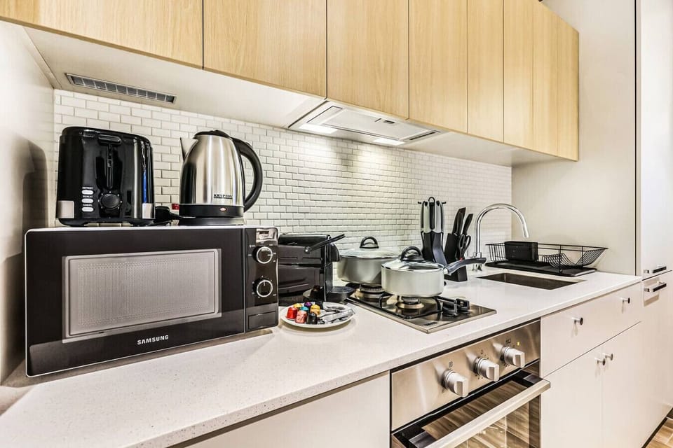 Modern Kitchen: Cook up a feast with sleek appliances and stylish finishes!