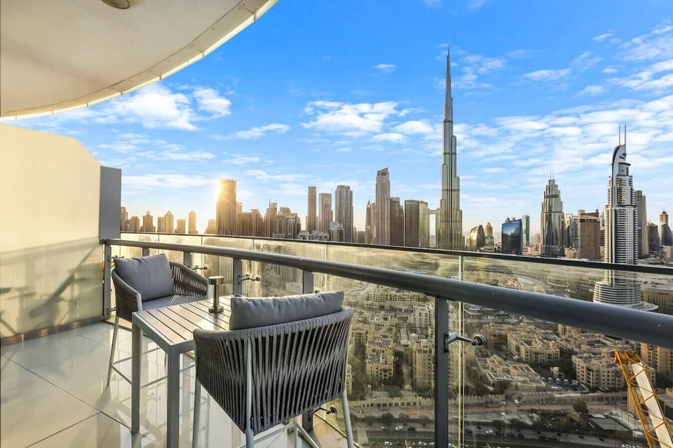 Balcony Retreat: Unwind with stunning city views and a chic outdoor dining space!