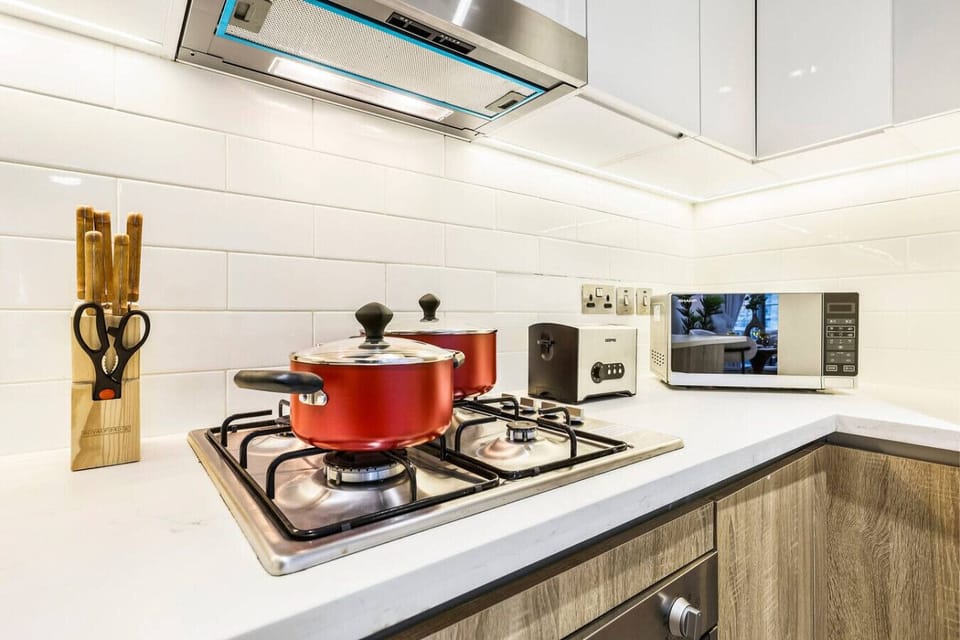 Stylish Kitchen: Cook up a storm with modern appliances and bright, inviting designs!