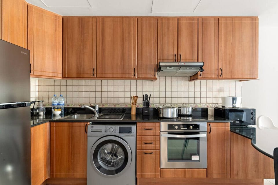 Kitchen Delight: Cook gourmet meals in this stylish, fully-equipped space with modern appliances!