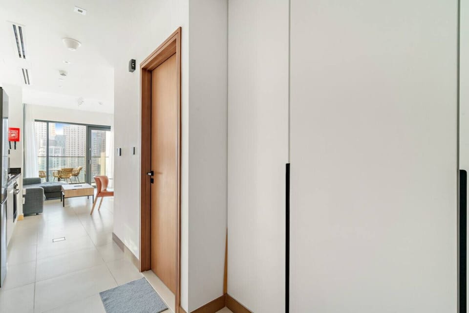 Entrance Hallway: Step into luxury with stunning city views and modern decor welcoming you!