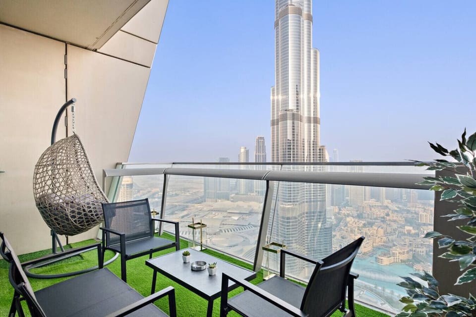 Balcony Oasis: Unwind with stunning views of Burj Khalifa in this stylish outdoor retreat!