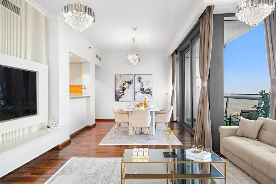 Living Room: Bright and elegant space with stunning views, perfect for relaxation or lively gatherings!