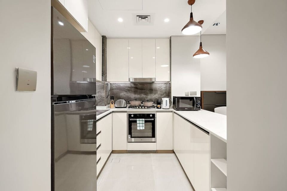 Modern Kitchen: Sleek design with premium appliances for your culinary adventures!