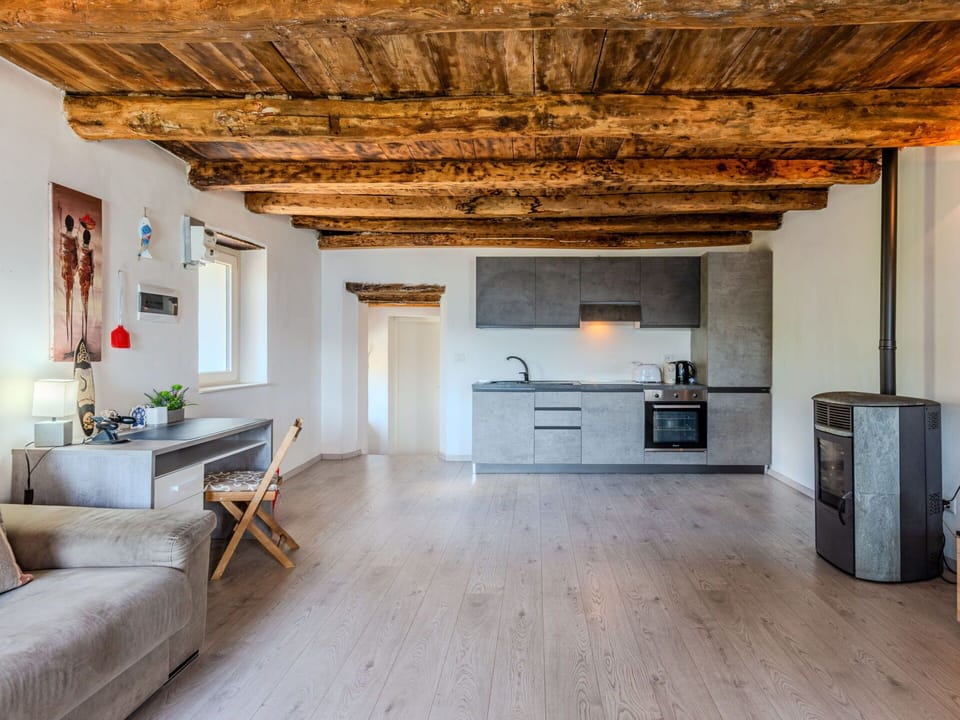 Furniture, Flooring, Wall, Floor, Wood, Interior Design, Ceiling, Wood Flooring, Room, Chair