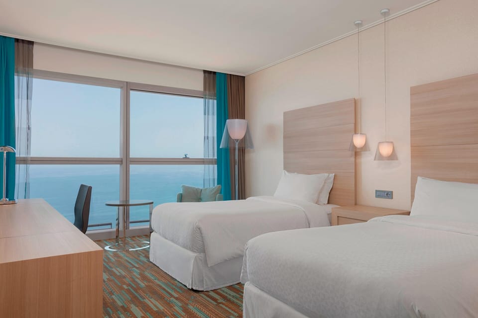 Premium Room, 2 Twin Beds, Sea View | Premium bedding, down comforters, pillowtop beds, minibar
