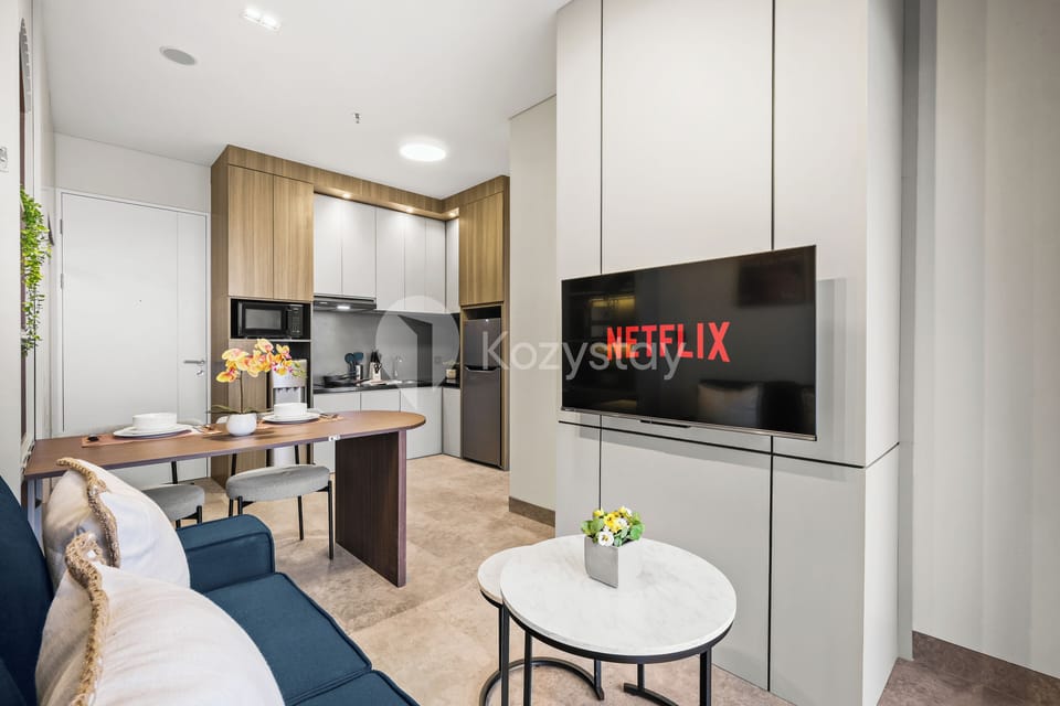 Apartment, 1 Bedroom, Balcony, City View | Living area | Flat-screen TV