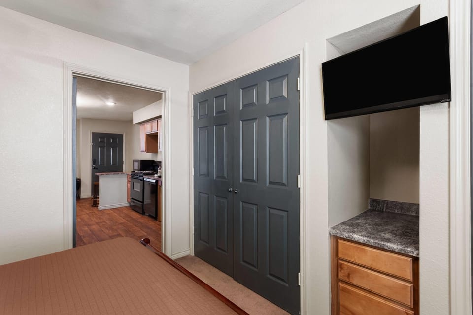 Suite, 1 Bedroom, Accessible, Non Smoking (Mobility, Roll-In Shower) | 1 bedroom, desk, laptop workspace, iron/ironing board