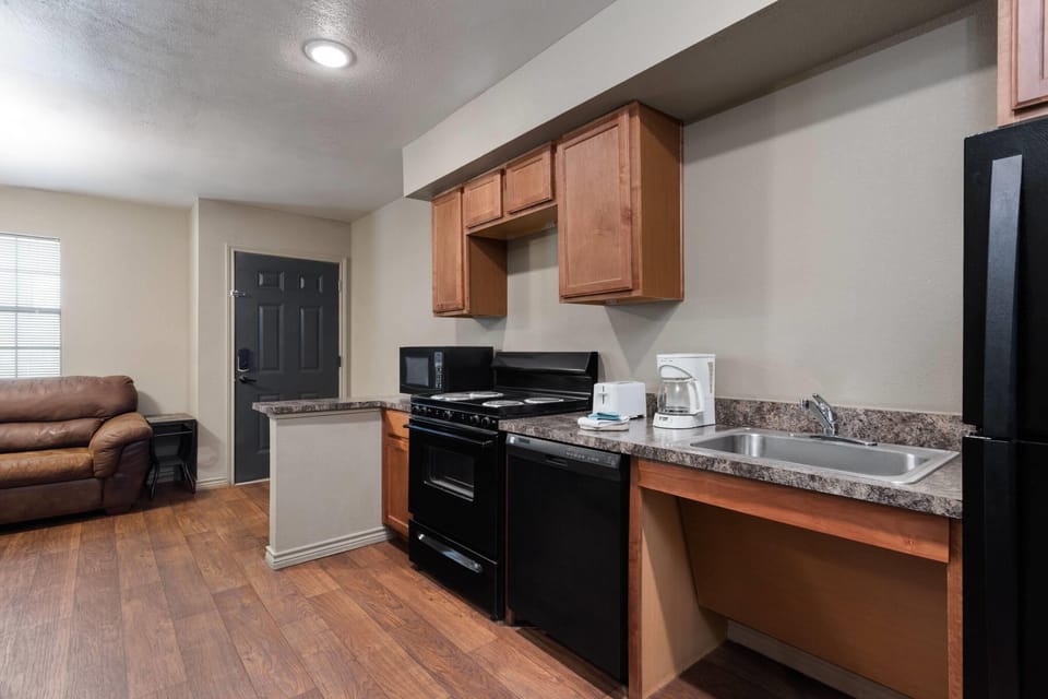 Suite, 1 Bedroom, Accessible, Non Smoking (Mobility, Roll-In Shower) | Private kitchen | Coffee/tea maker, full-size fridge, microwave, stovetop
