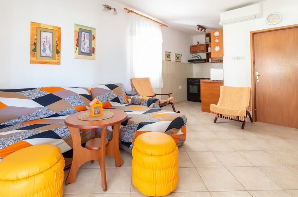 Standard Apartment, Patio, Garden View | Living area | 100-cm LCD TV with satellite channels