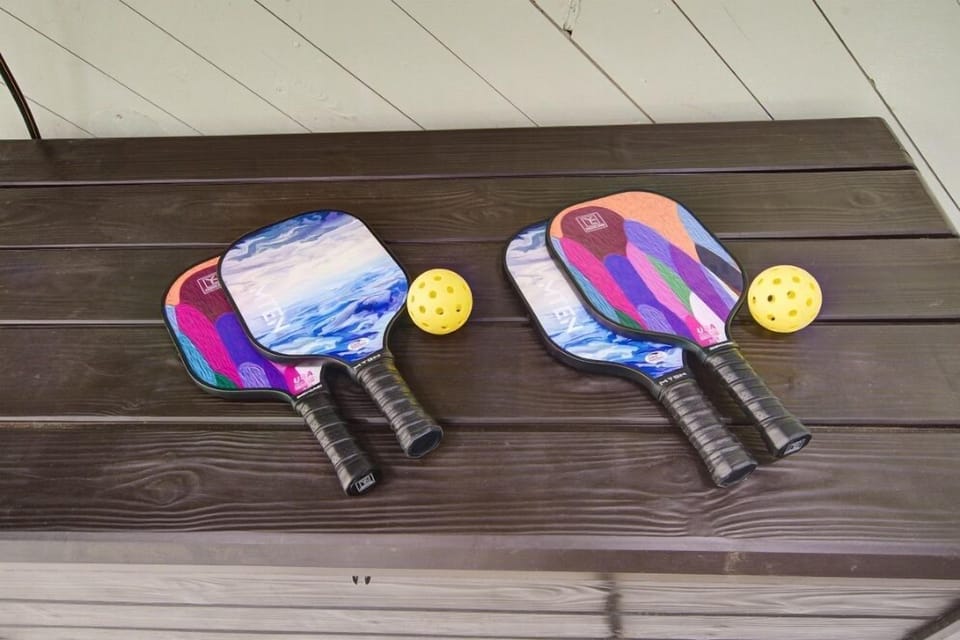Boogie boards and pickle ball equipment provided